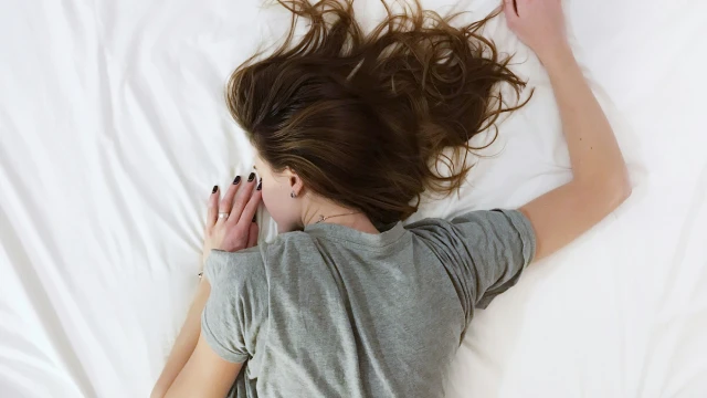 Tourist experiencing travel fatigue and jet lag after arriving in Bali